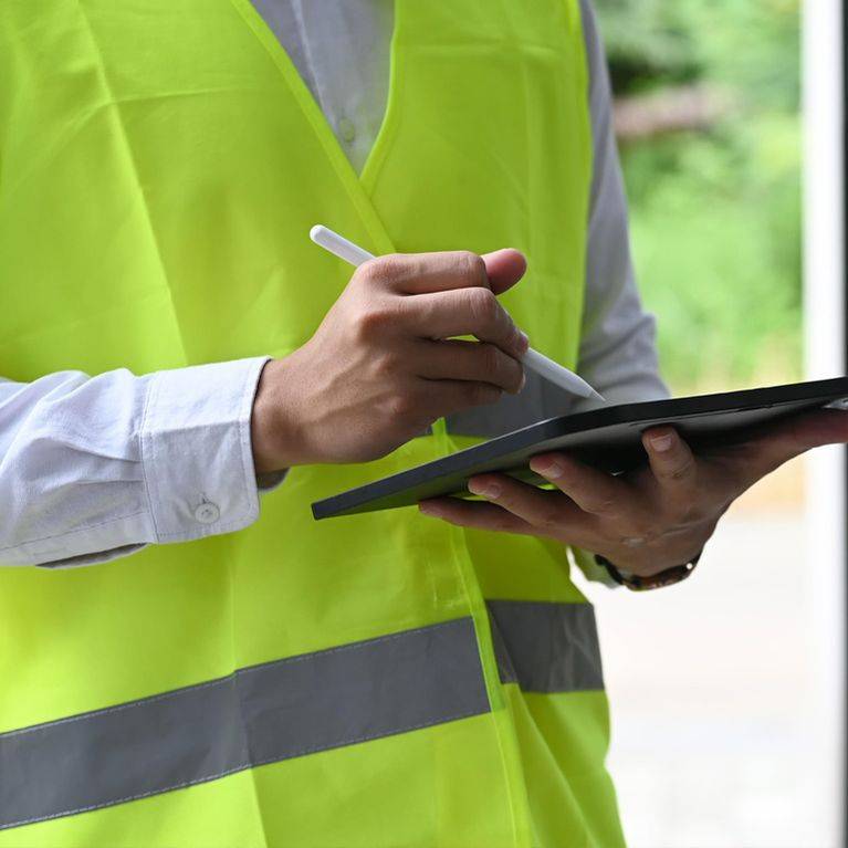 Construction foreman conducting inspection